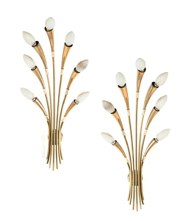 Due applique in ottone a sette luci