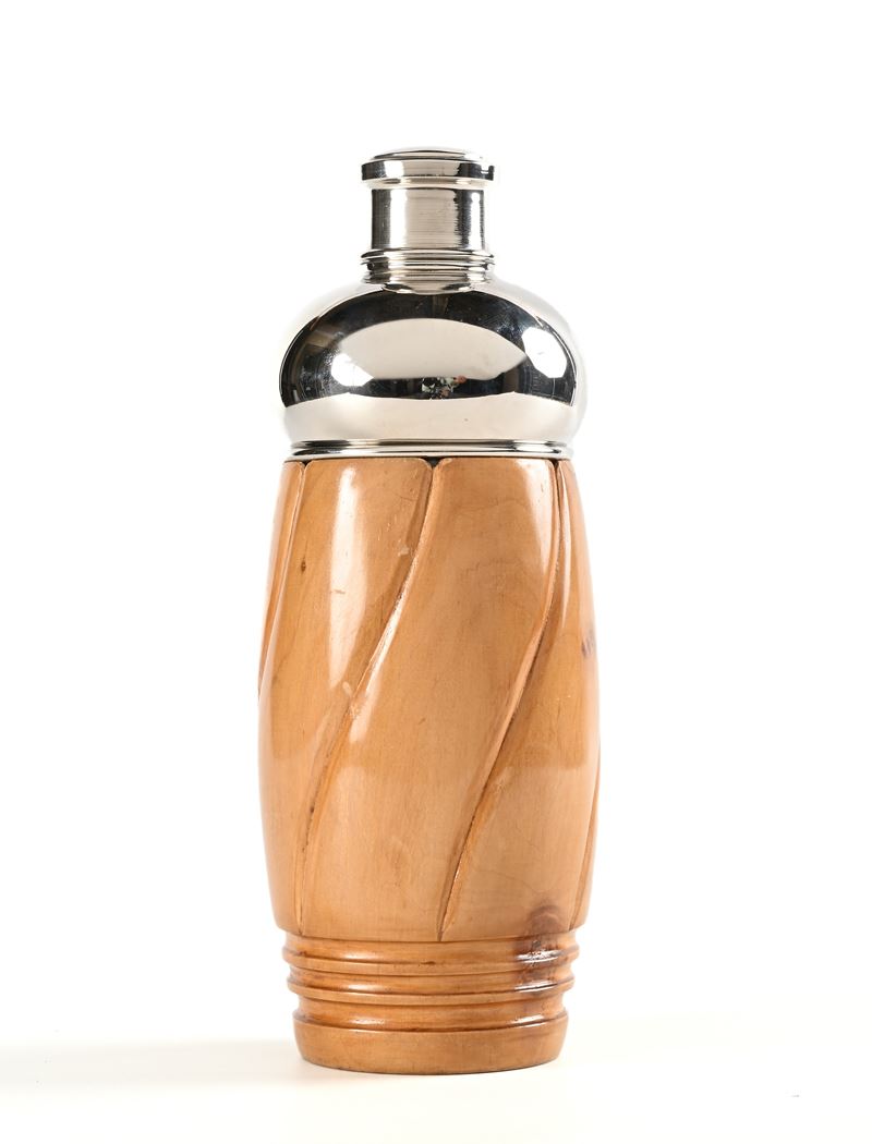 Schaker, Oggetto decorativo in legno e metallo cromato
