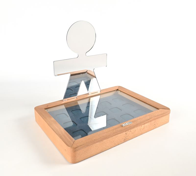 Specchiera dalla Serie Girotondo, Produzione Alessi