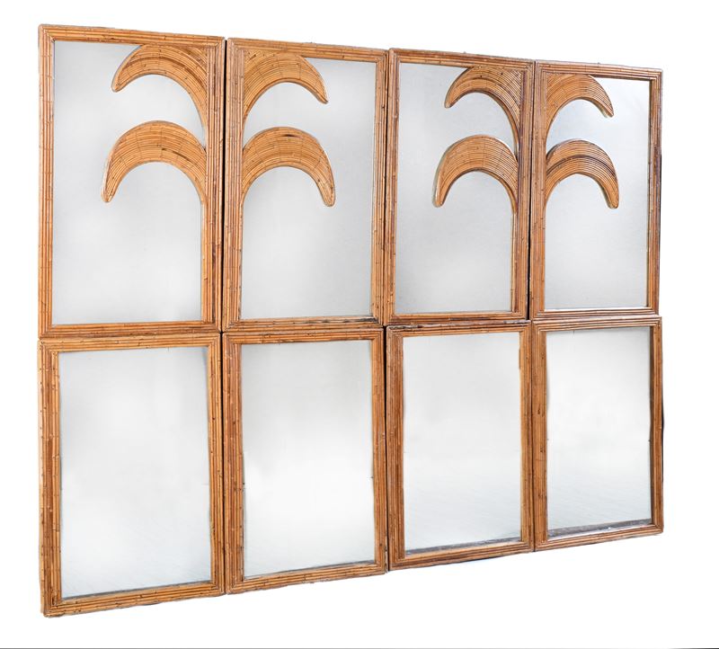 Raffinata specchiera decorata con profili di palme