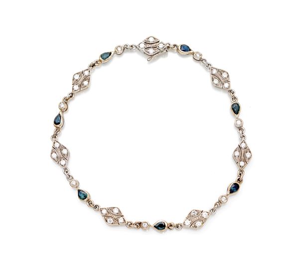 Bracciale in oro, brillanti e zaffiri.