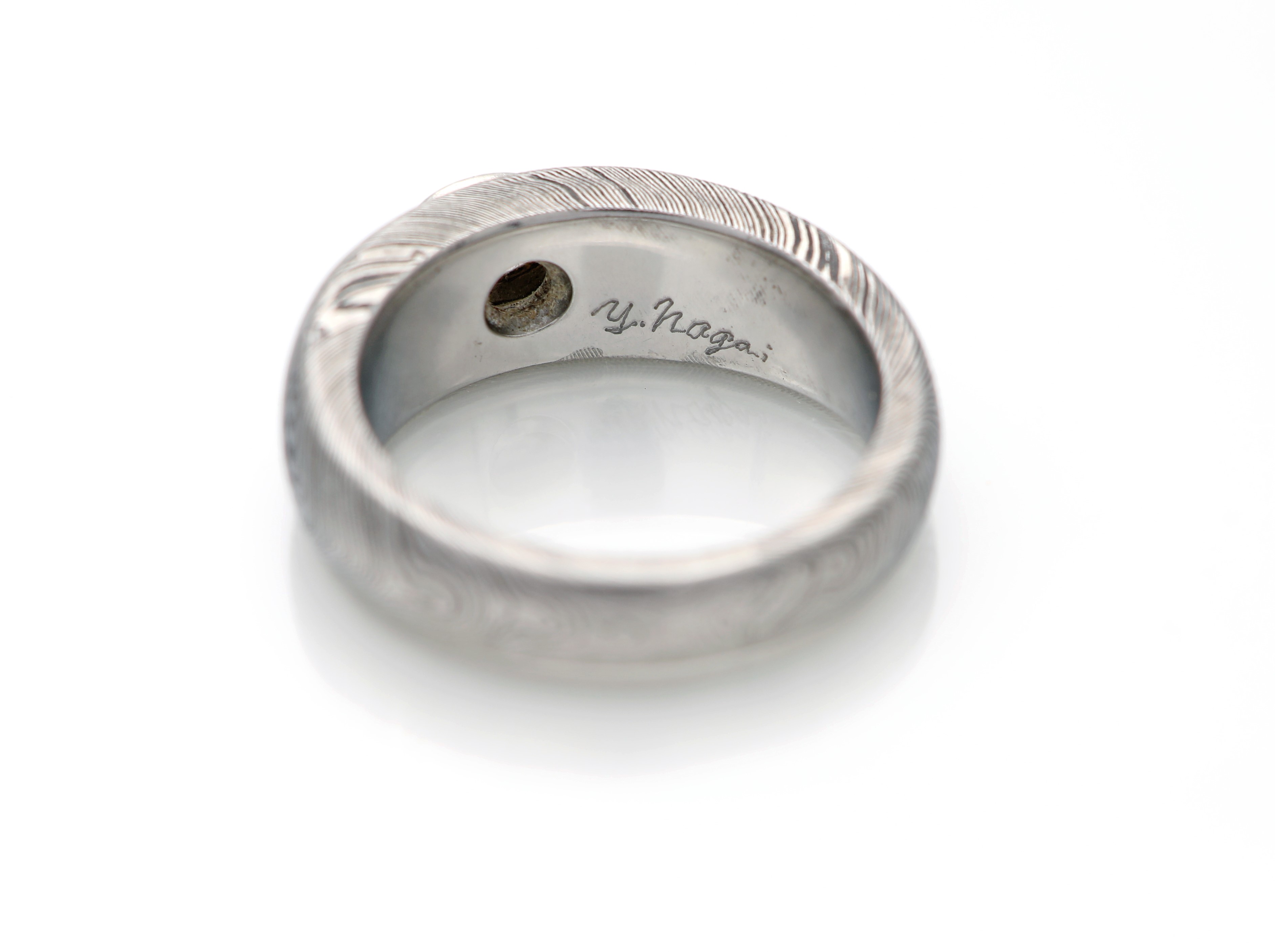 Nagai, anello in titanio e diamante