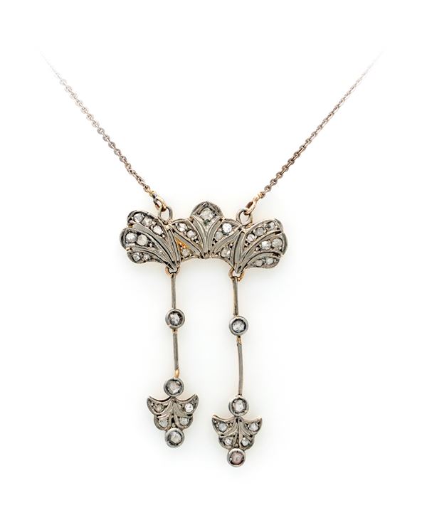 Pendente antico a doppio elemento in oro e diamanti