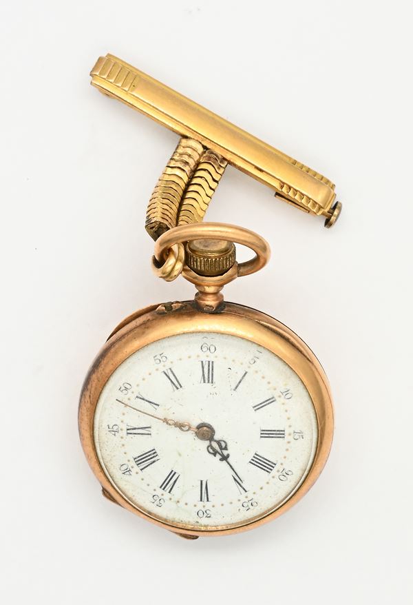 Orologio da tasca monachina con scappamento a cilindro remontoir da donna in oro giallo 18Kt con spilla in metallo