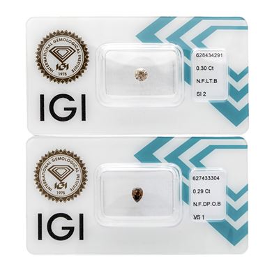 Diamanti naturali fancy color, taglio rotondo ct. 0,30 e taglio goccia ct. 0,29 in blister