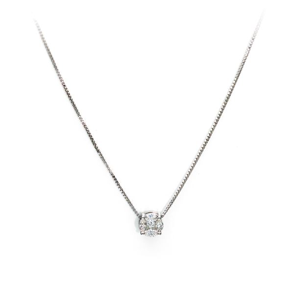 Pendente punto luce in oro e diamanti