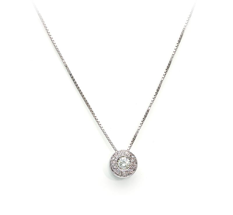 Pendente punto luce in oro bianco 750 e diamanti