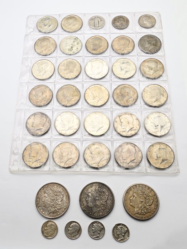 Lotto monete USA: Dollaro 1879S, 1897, 1921S; 27 pezzi da 1/2 dollaro (10 1964, 17 1965/68); 3 pezzi da 1/4 di dollaro; 4 pezzi da 10 Cts