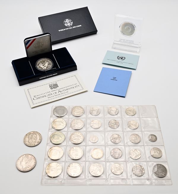 Lotto 50 Cts 1862T, 5 Lire 1877 Vittorio Emanuele II; 1 Lira 1910, 12 monete da 5 lire (1927, 1929 e 1930): 10 Lire 1927 Vittorio Emanuele III; 5 Marchi 1934D e 1934 21 marzo 1933, 1935J, 1936A e D; Dollaro 1889, Dollaro Proof 1994S Usa, 4 monete da 1/2 dollaro (1942D, 1964, 1967 x2); 2 Pesetas 1882; 5 Franchi 1979, 1 Franco 1934 e 1/2 Franco 1914 Svizzera; Medaglia Nazioni Unite 1974
