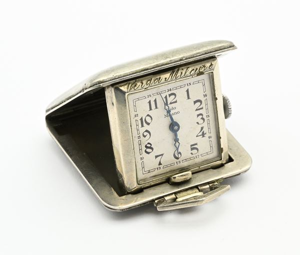 Lido Milano - Orologio da viaggio con scappamento a cilindro remontoir in metallo  (1930 circa)  - Asta Asta a Tempo - Orologi da Tasca - Casa d'Aste Arcadia