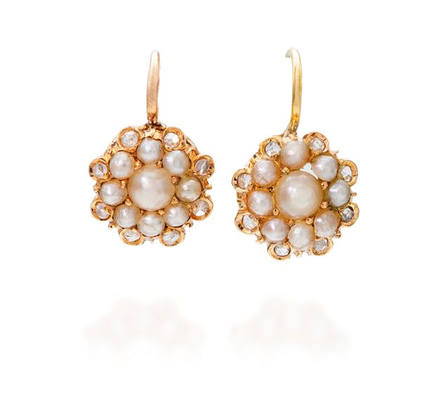 Orecchini in oro e microperle