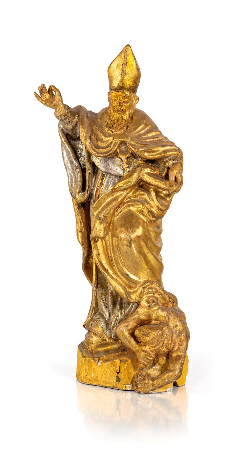 Scultura in legno dorato e argentato, raffigurante un santo vescovo che scaccia un demonio, XVII ...