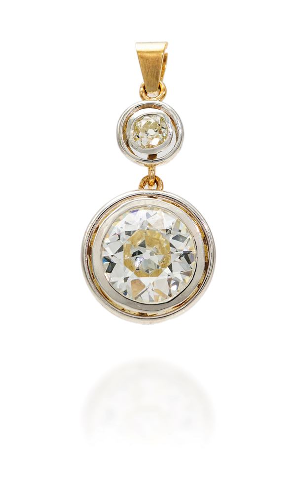 Pendente antico in oro, argento con diamante solitario