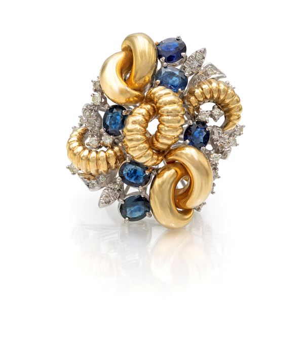 Anello a fiore in oro, brillanti e zaffiri