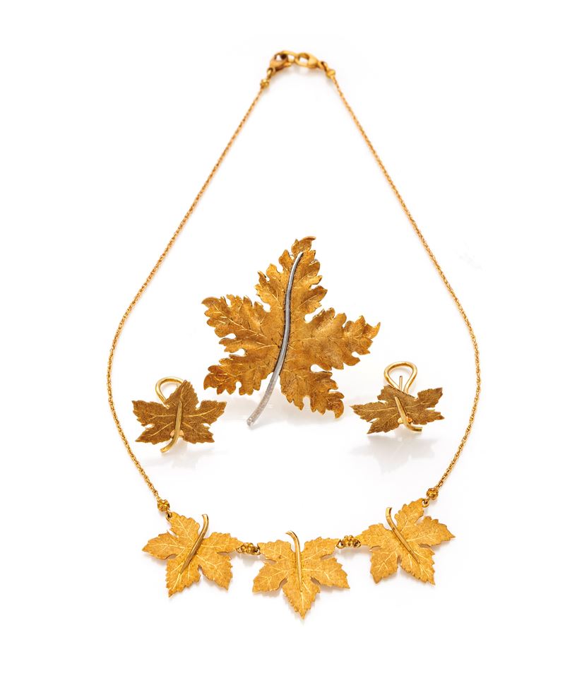 Federico Buccellati, parure di girocollo, orecchini e spilla in oro