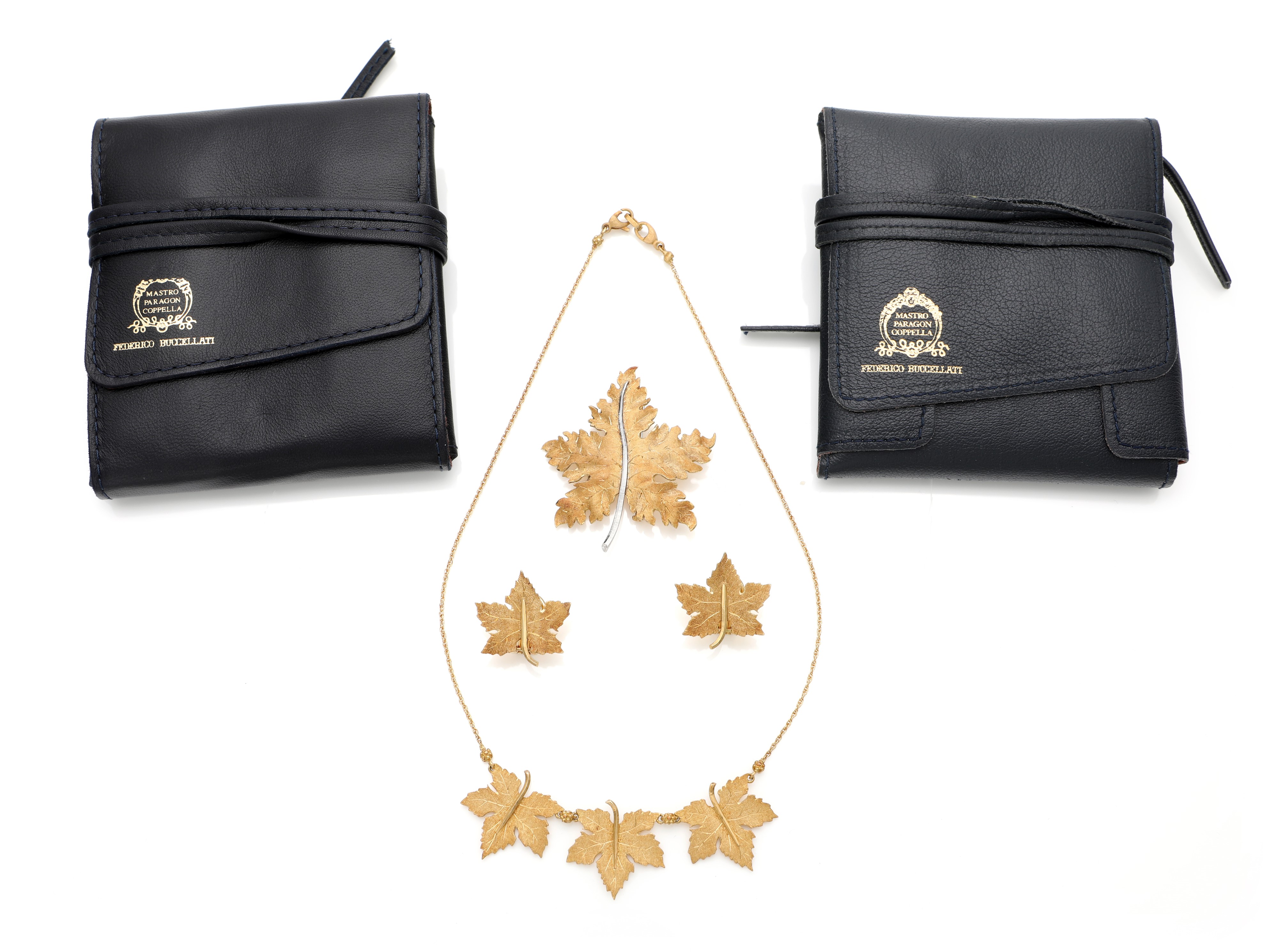 Federico Buccellati, parure di girocollo, orecchini e spilla in oro
