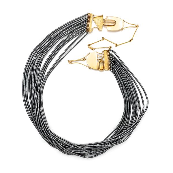 Zanchi, collana di design in oro, topazi ed ematite