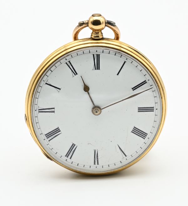 Orologio da tasca con carica a chiavetta con cassa in oro 18Kt decorata a guilloché ed incisioni a volute. Scappamento a cilindro