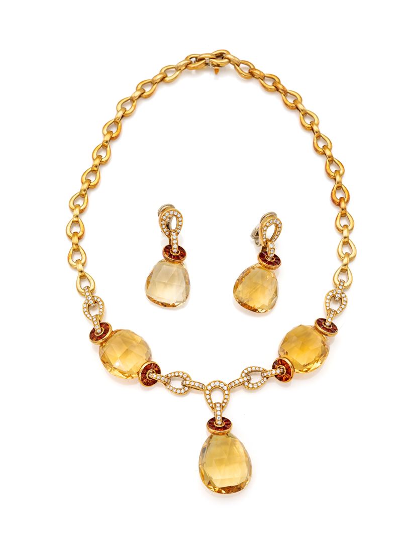 Parure collana e orecchini in oro, brillanti e topazi