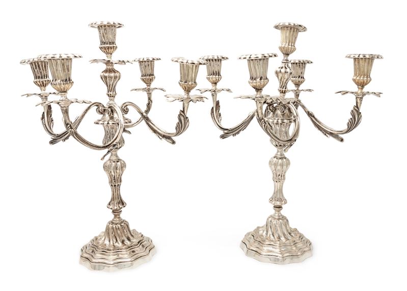 Coppia di candelabri in argento 800/000 a cinque luci