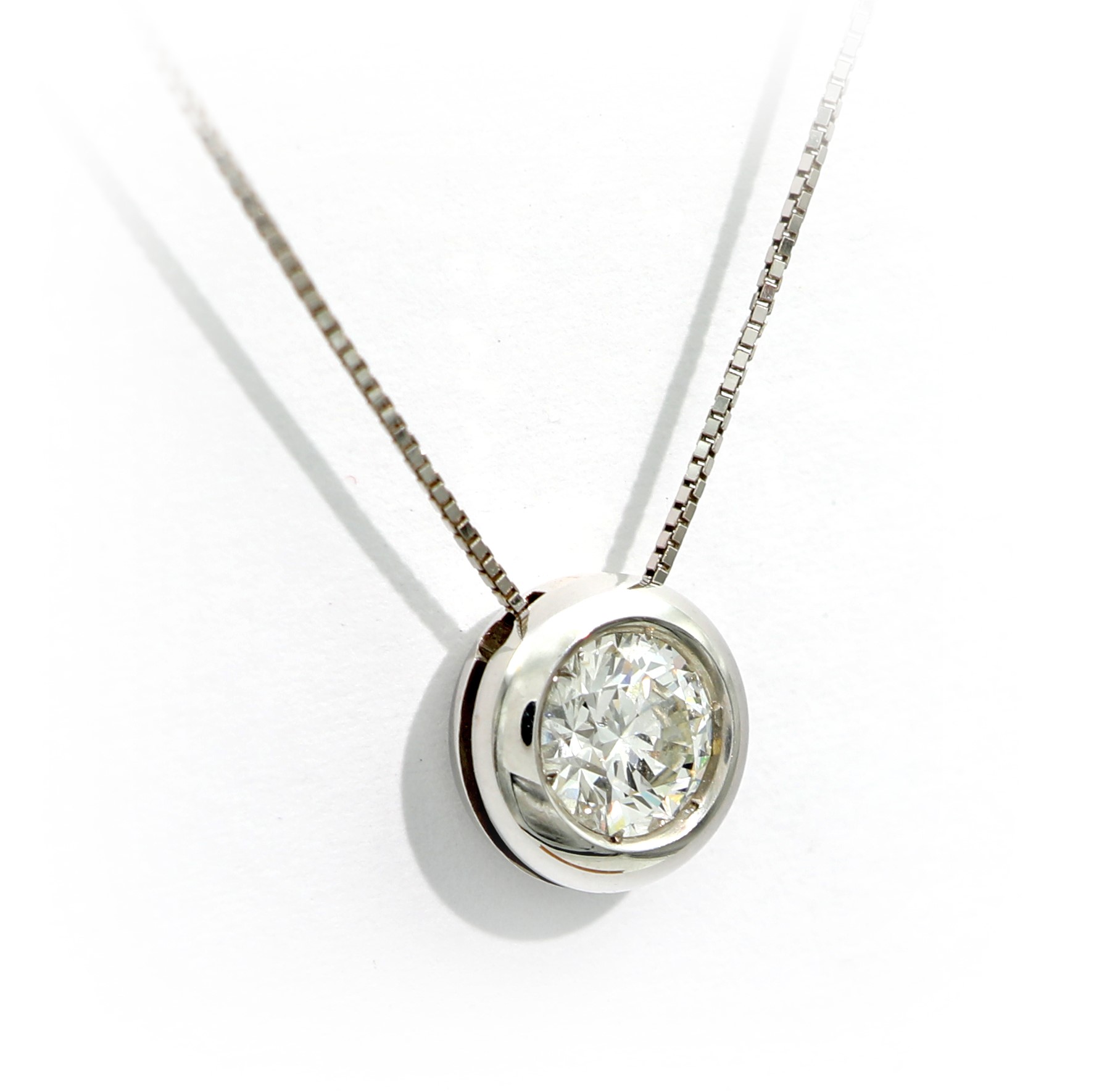 Pendente punto luce in oro e brillante