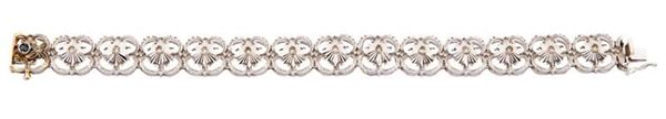 Bracciale in oro bianco a cerniere con sbalzo a fiore