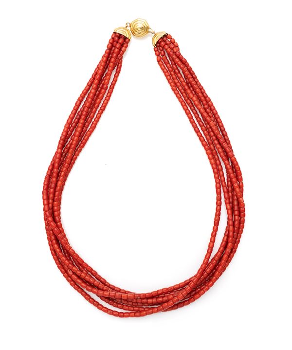 Torchon in oro e corallo