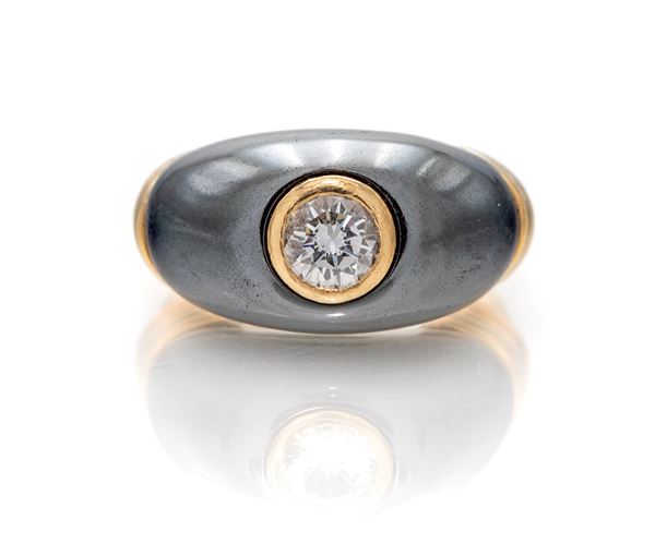 Cartier, anello in oro, ematite e brillante