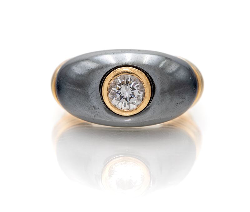 Cartier, anello in oro, ematite e brillante