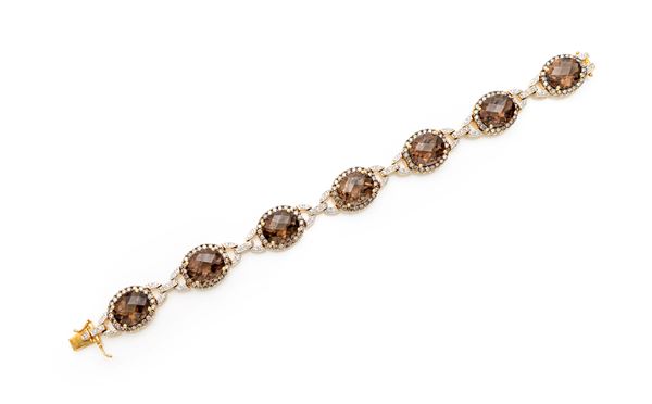 Bracciale in oro, brillanti, brillanti fancy e quarzi