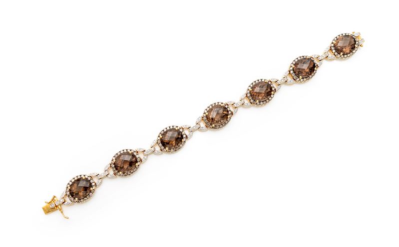Bracciale in oro, brillanti, brillanti fancy e quarzi