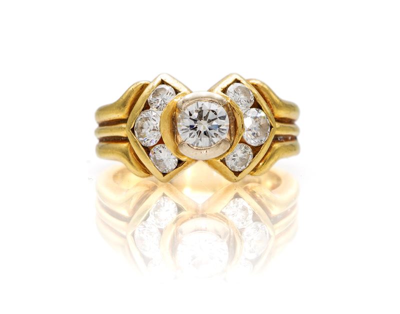 Anello in oro giallo 750, brillante solitario di ct 0,35 e brillanti