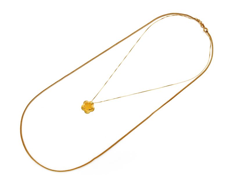 Coppia di lacci in oro giallo 750/000