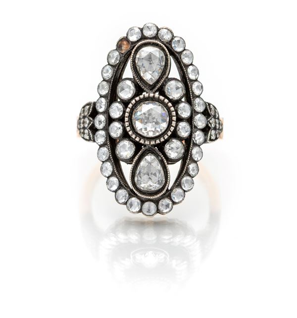 Anello a spola in oro e diamanti