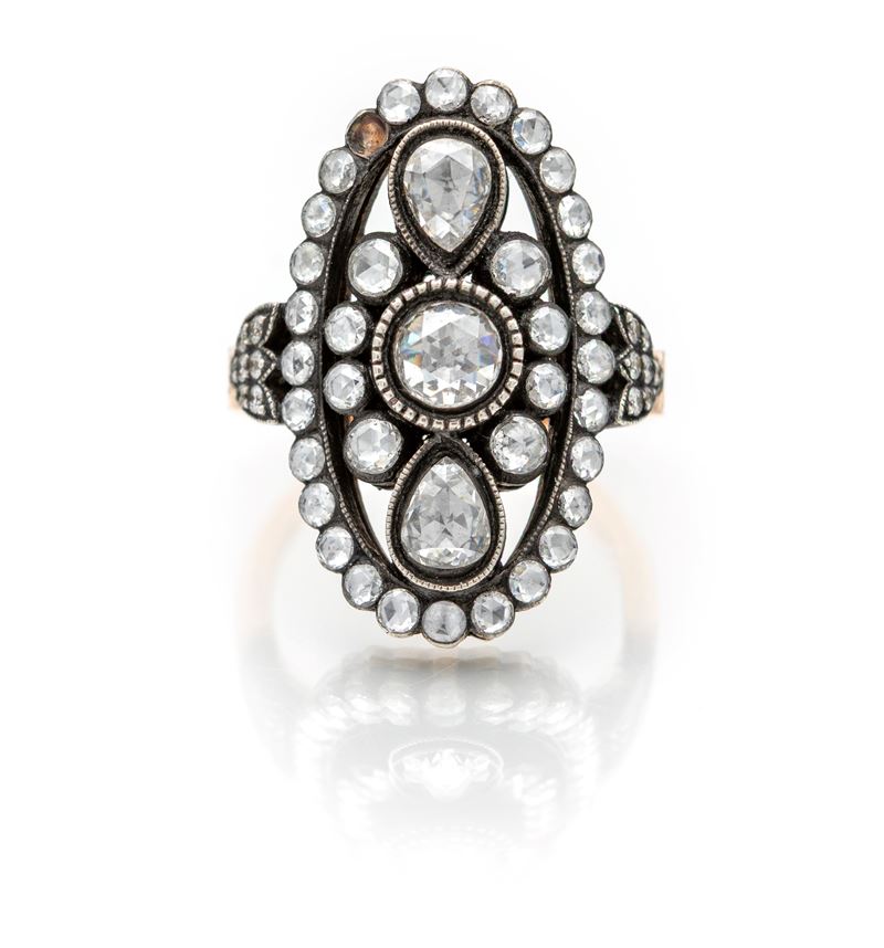 Anello a spola in oro e diamanti