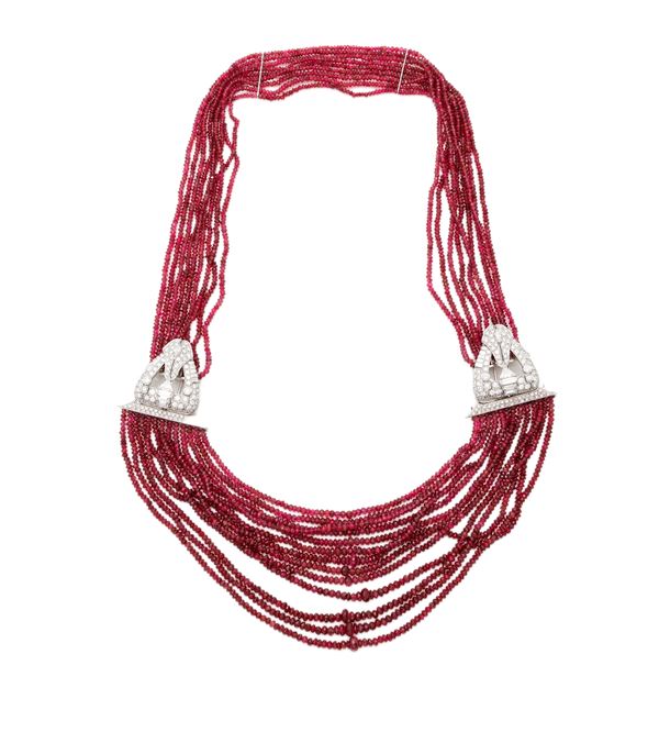 Collana in oro, rubini e brillanti