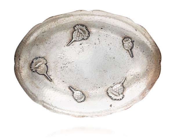 Vaschetta ovale con orlo sagomato