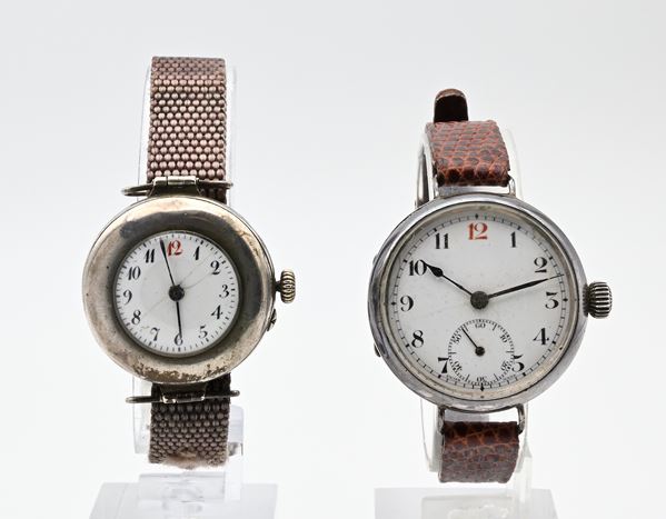 2 Orologi militari anni '20 con meccanismi svizzeri a carica manuale e casse in argento (925/000 e 800/000)