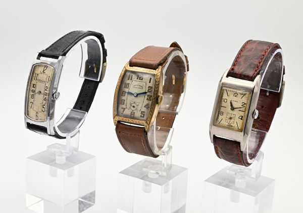 3 orologi svizzeri da polso di forma a carica manuale da uomo anni '30/'40: Cyma 334.A in metallo cromato con fondello in acciaio Nr.133451456; Ovale Watch 129 in metallo placcato in oro giallo 15 rubini Nr.1668; Hermin 17 Rubis in metallo cromato con fondello in acciaio