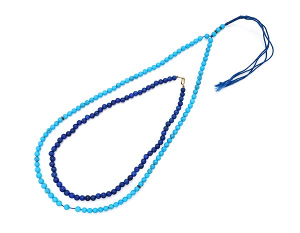 Coppia di collane in lapis, turchese ed oro