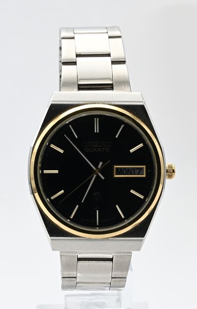 Orient 54916117-70ca - Orologio da Polso al Quarzo Day-date da Uomo in Acciaio con Ghiera Dorata