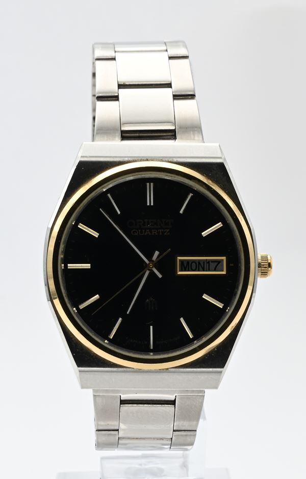 Orient 54916117-70CA - Orologio da polso al quarzo day-date da uomo in acciaio con ghiera dorata