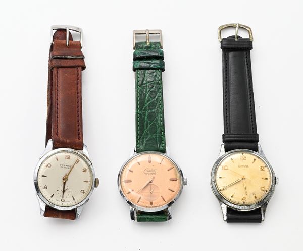 3 Orologi da polso a carica meccanica da uomo in metallo cromato con fondelli in acciaio: Doxa (5947399.14013.1); Creation Neuchatel 17 rubini; Transea 15 rubini