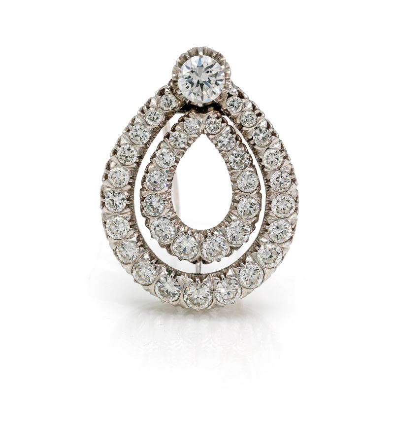 Spilla a goccia, oro bianco 750/000 con diamante solitario e diamanti di contorno