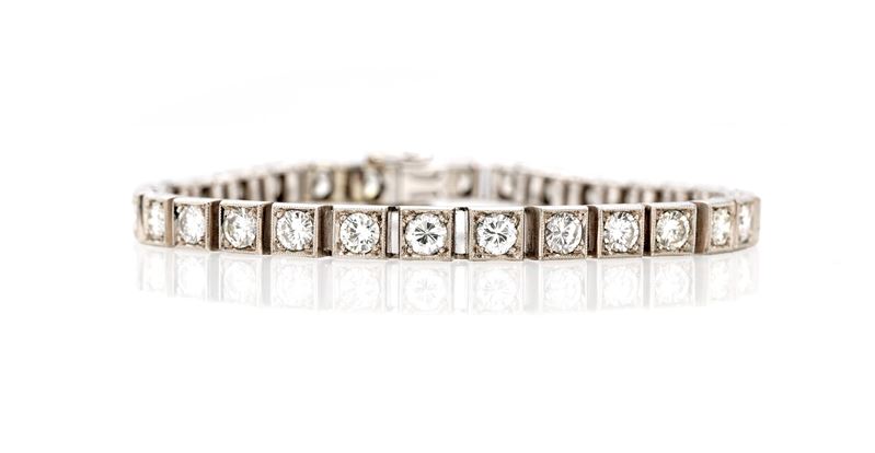 Oro bianco 750/000, bracciale tennis con diamanti rotondi brillanti