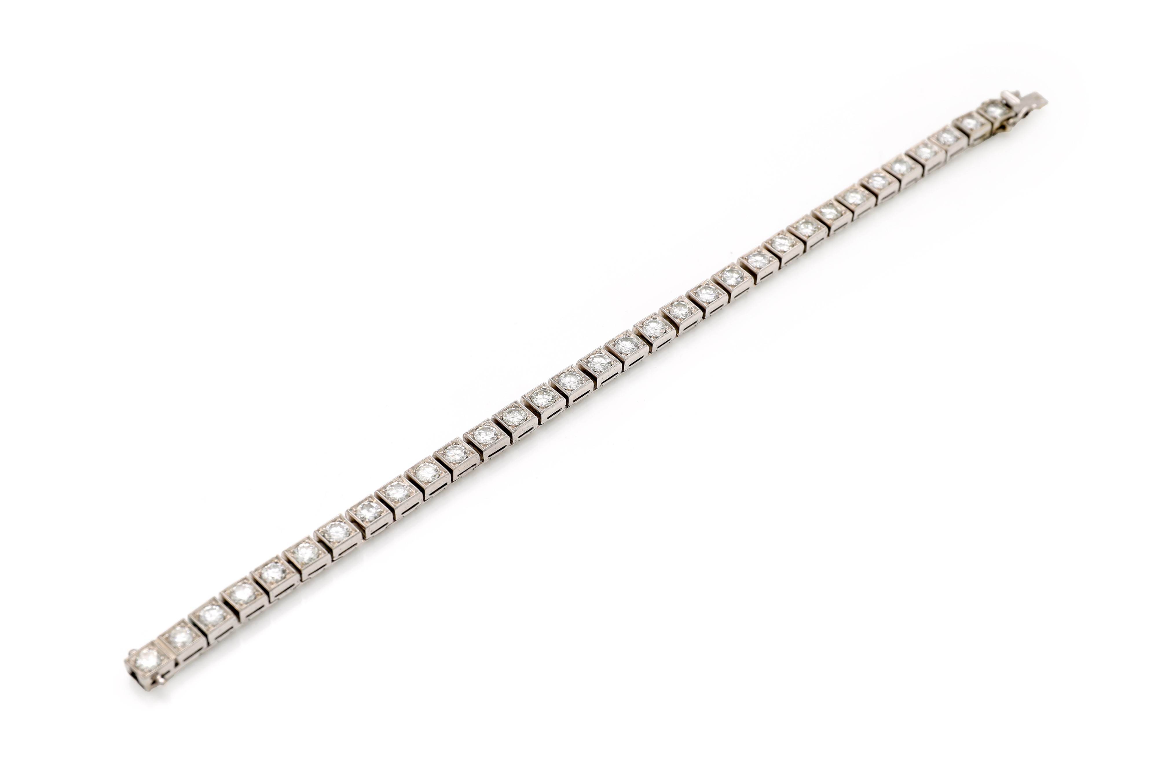 Oro bianco 750/000, bracciale tennis con diamanti rotondi brillanti