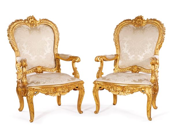 Coppia di poltrone in legno intagliato e dorato, Roma, XVIII secolo