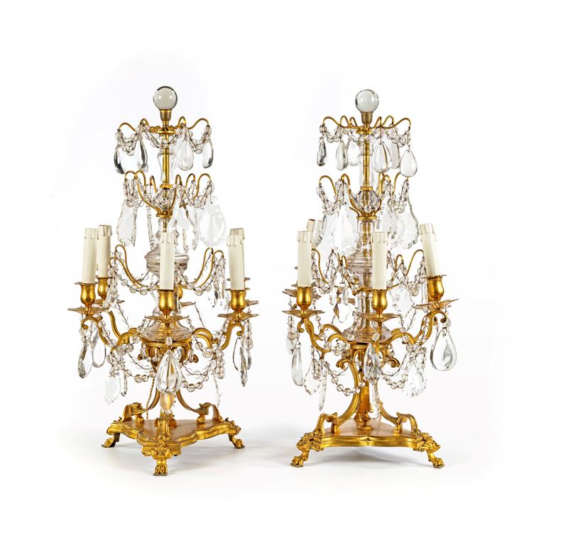 Coppia di girandoles in bronzo dorato e cristallo a sei luci, XIX secolo