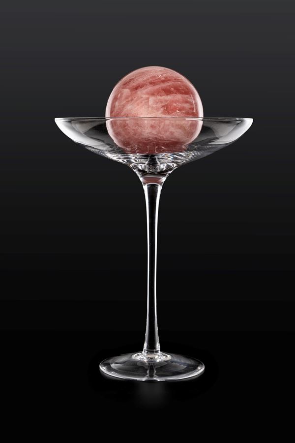 Alzata in vetro incolore con sfera in marmo rosa