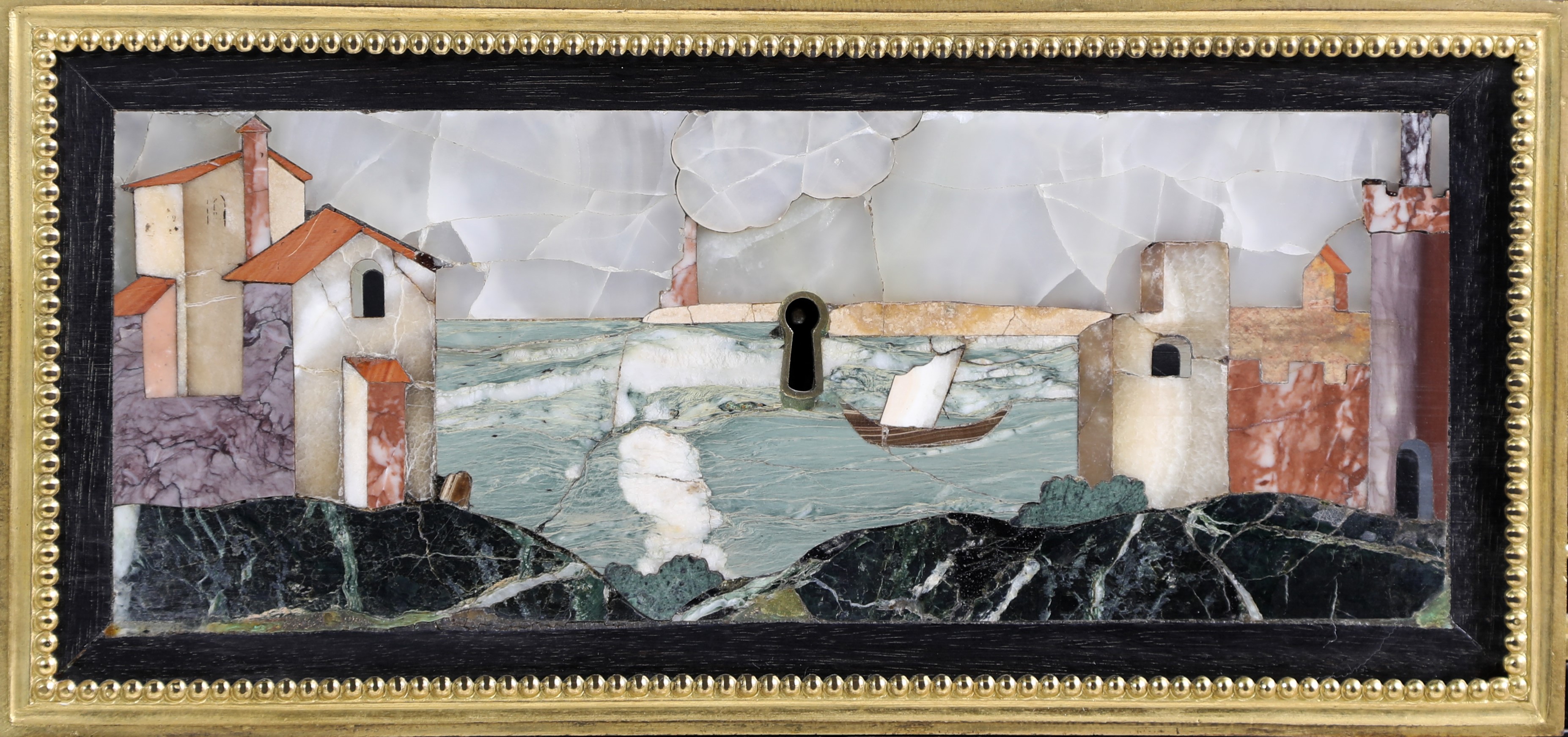 Coppia di piccole credenze in legno ebanizzato con ricca ornamentazione di bronzi e placche in co...